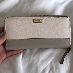White and beige Kate spade wallet